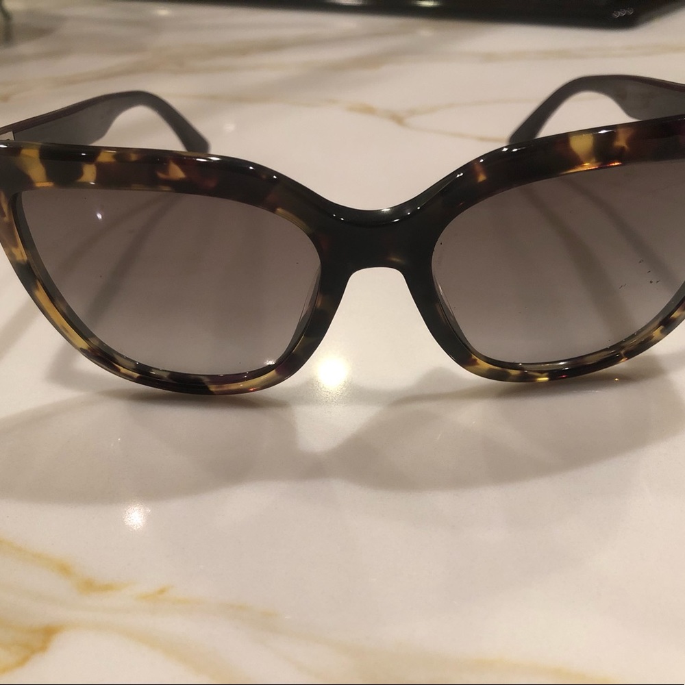 Fendi (authentic) sunglasses. Tortoise shell frame w/ dark lenses.